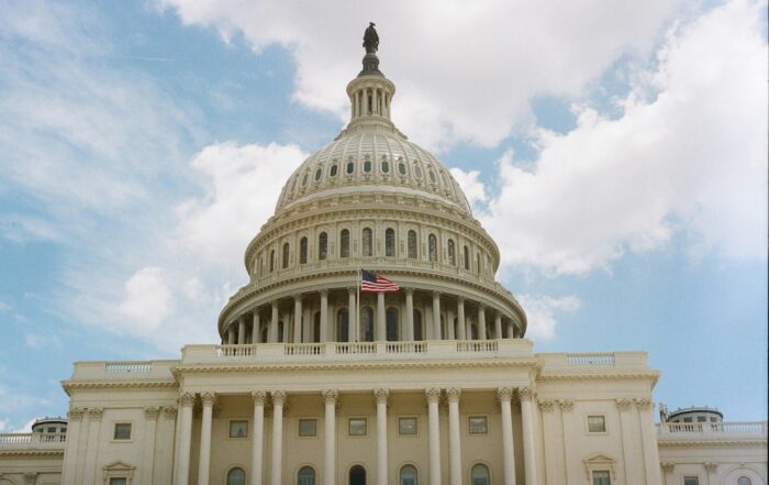 Capitol building with flag