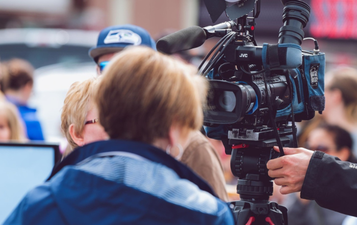 reporter with a camera